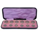 A Victorian cased set of twelve silver buttons by Levi & Salaman.