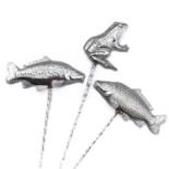Three contemporary .999 fine silver olive picks by James Suddaby.