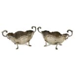 A pair of Victorian silver twin handled salts.