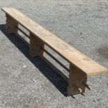 A 19th century elm refectory bench.
