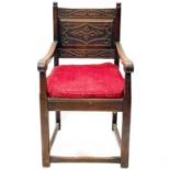 A late Victorian oak hall arm chair.