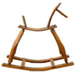 A cider barrel rocking horse.