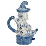 A Deflt blue and white character jug and cover as Mr Punch.