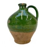 A 19th century French pottery oil jug.