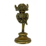 A late Victorian brass Lincoln Imp door stop.