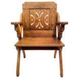 A late Victorian pitch pine Gothic side chair.