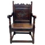 A 17th century oak North Country Wainscot armchair.