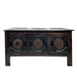 A 17th century oak coffer.