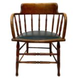 An early 20th century oak bow smokers chair.