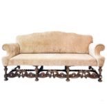 A William and Mary style walnut framed upholstered settee