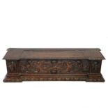 A late 19th century walnut carved cassone.