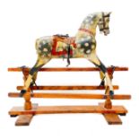 A Victorian dapple grey rocking horse.