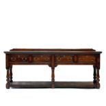 A George III style oak low dresser.