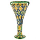 A Moroccan pottery twin handled vase, 19th century.