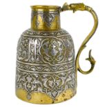 A Syrian brass and silver jug, 19th century.