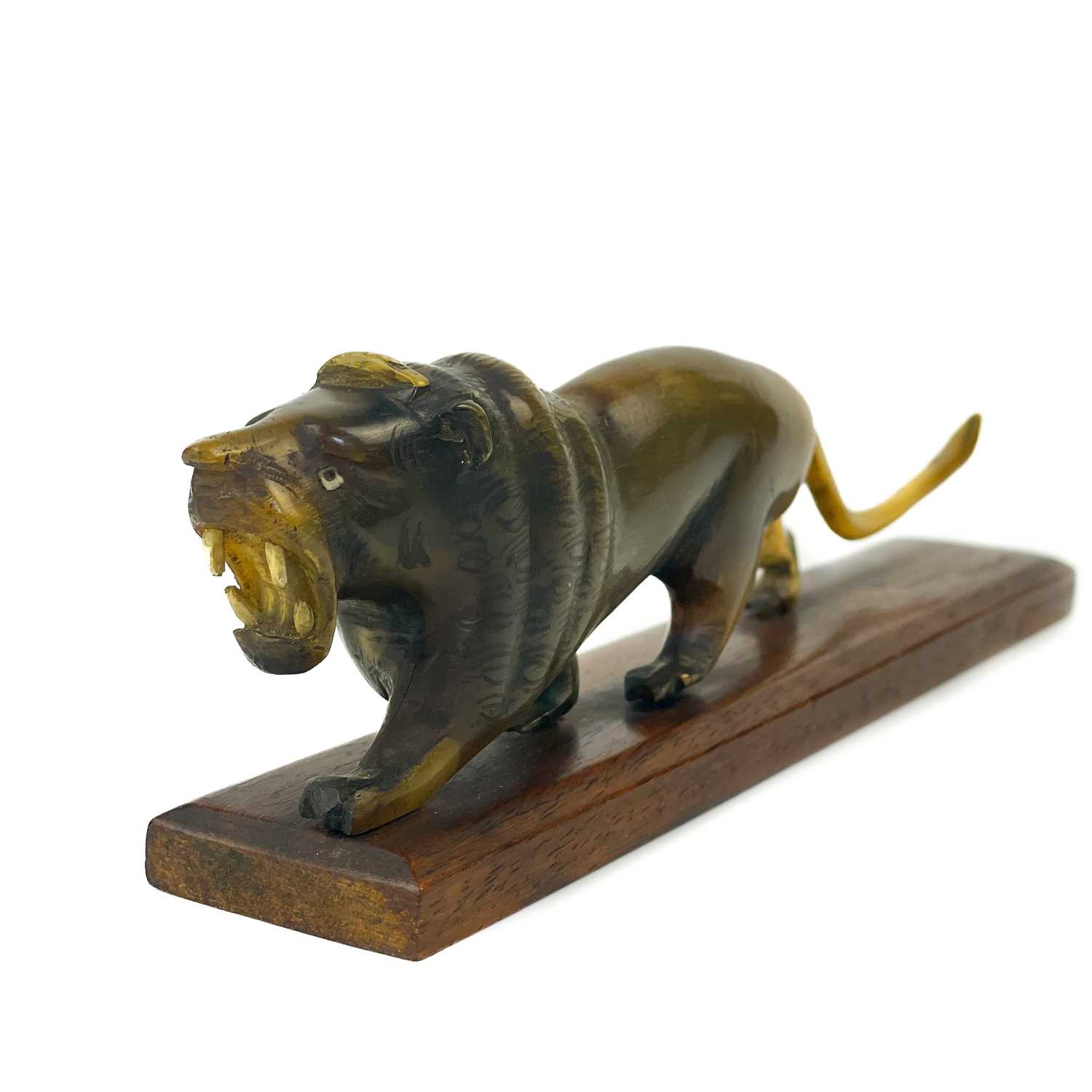 A Chinese carved horn model of a lion, early 20th century. - Image 3 of 6