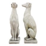 A pair of reconstituted stone whippets.