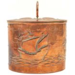 A Newlyn copper oval tea caddy.