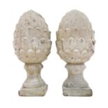 A pair of reconstituted stone finials.