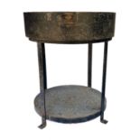 An architectural salvage garden table with lazy Susan top