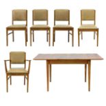 A Gordon Russell Broadway beech and walnut dining table and five chairs.