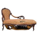A mid 19th century walnut chaise longue.