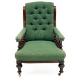 A Victorian mahogany framed armchair.