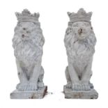 A pair of reconstituted stone lions.