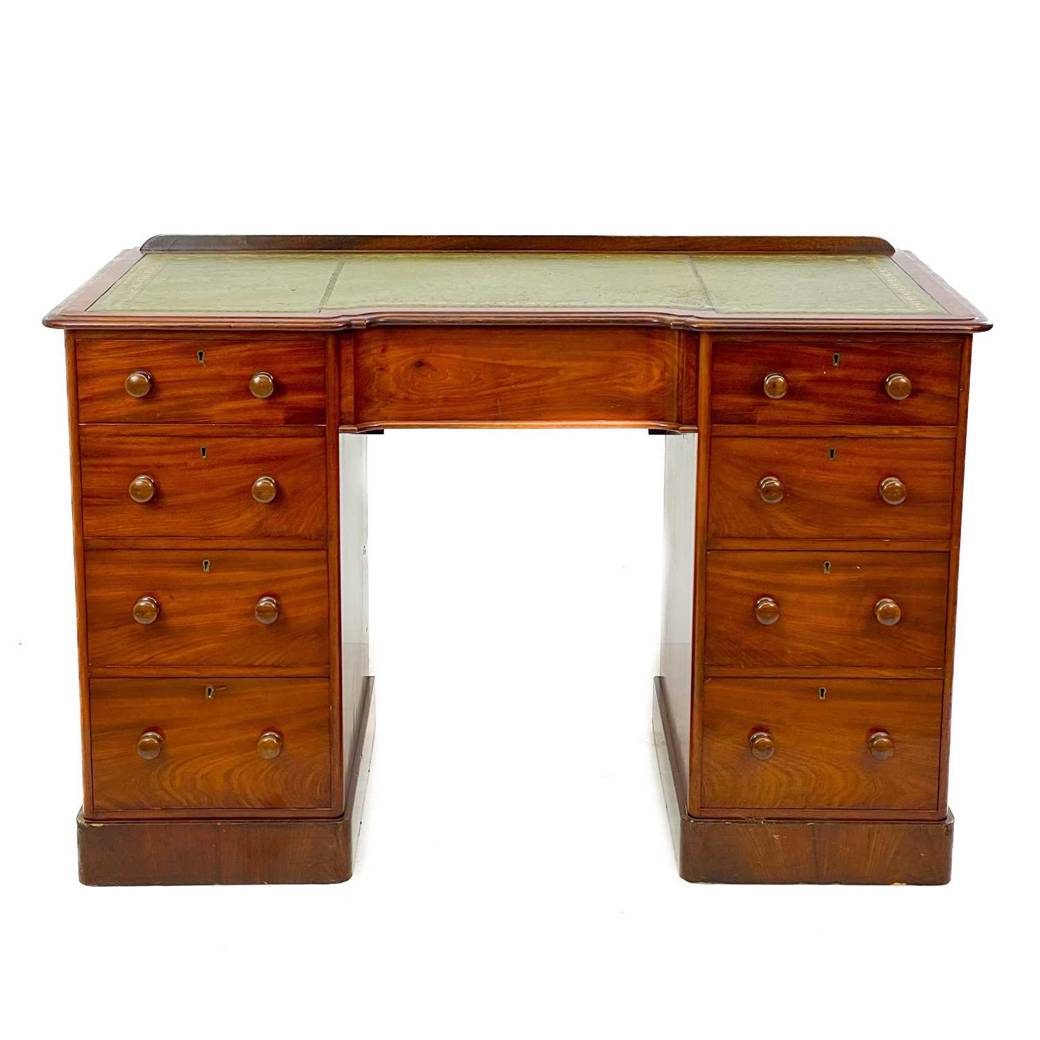 A Victorian mahogany fixed pedestal desk.