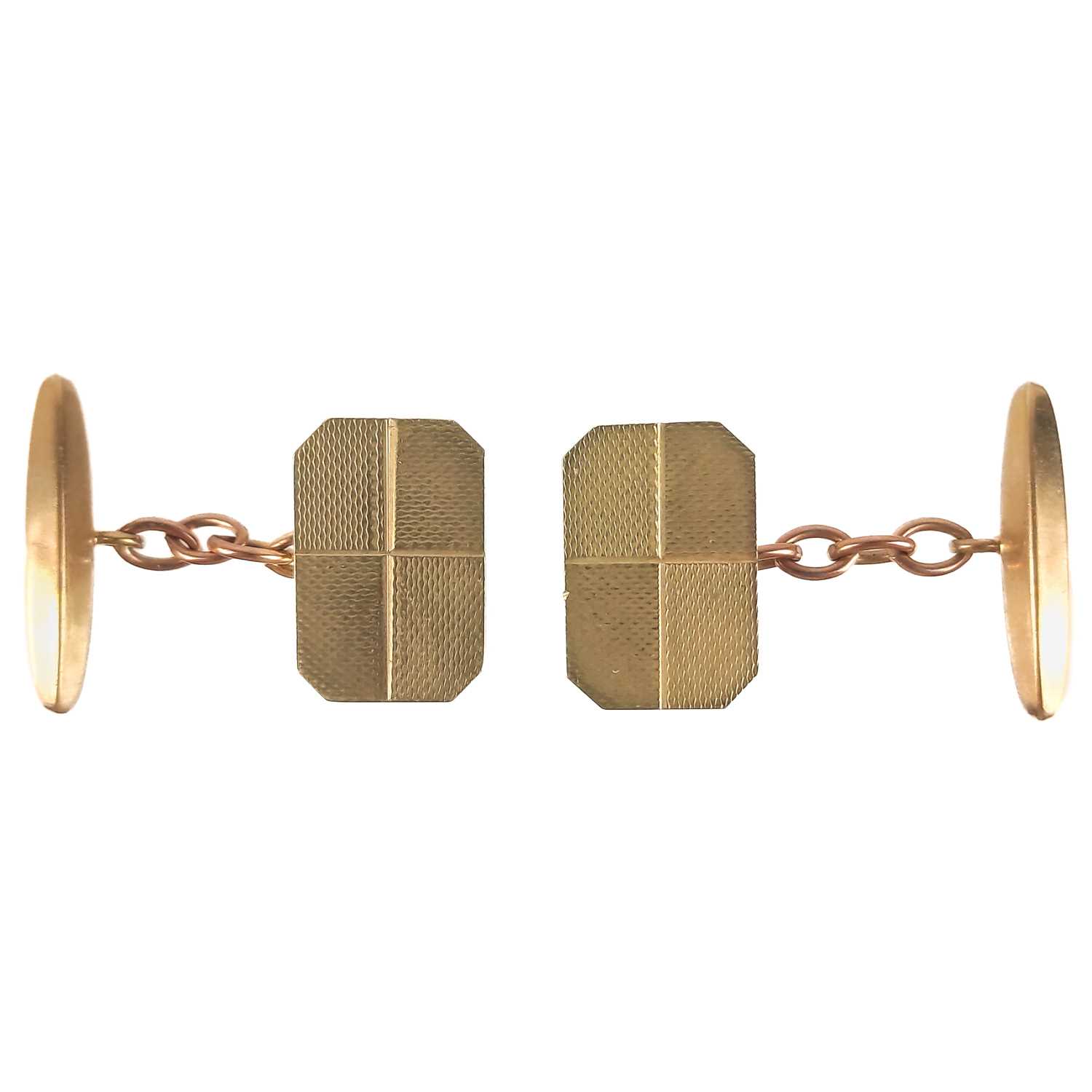 A pair of 9ct rose gold cufflinks.