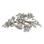 An impressive Victorian silver and gold diamond foliate spray 'en tremblant' brooch.