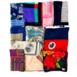 Eleven various vintage designer printed silk scarves.