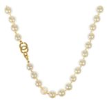 A Chanel faux pearl necklace.