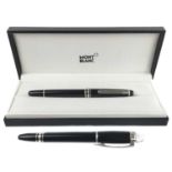 Two Mont Blanc roller ball pens.