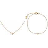 A Cartier 18ct rose gold diamond solitaire set pendant necklace and bracelet set.