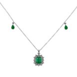 An attractive and unusual 18ct white gold diamond and emerald cluster pendant necklace.