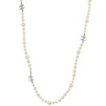 A Chanel faux pearl and gold-tone CC crystal set necklace.