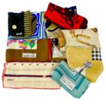 Ten various vintage designed printed silk scarves.