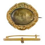 A Victorian 15ct gold bar brooch with loop suspension.