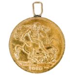A 1913 sovereign gold coin with loop for a pendant.