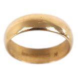 A 22ct hallmarked gold band ring.