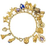 A gilt-metal charm bracelet applied with many charms.