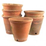 Six hand thrown terracotta flower pots.