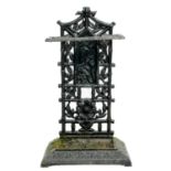 A Victorian Aesthetic movement cast iron stick stand.