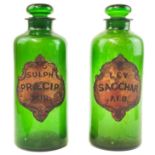 A pair of 19th century green glass Pharmacy or Chemist jars and stoppers.