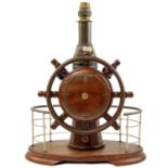 A teak nautical table lamp.