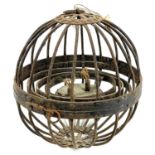 A 19th century gimbal cage lamp.