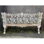 A pair of mid 19th century cast iron garden benches.