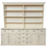 A late Victorian country house painted pine dresser in two parts.
