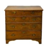 A George III oak chest of drawers.